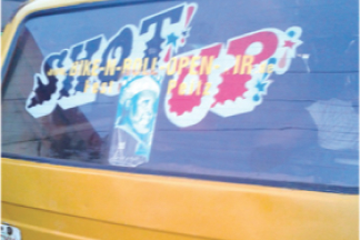 Fig. 12, A minibus taxi with the slogan: “Shot Up!”. The letterforms bear a semblance to those in Fig. 11.