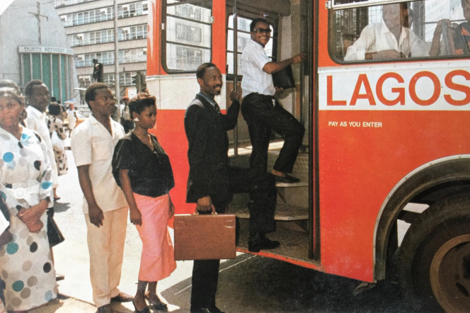 Fig. 2, ©National Library of Nigeria. Passengers board a bus. Lagos Island, Nigeria.